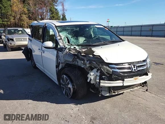 ✅ 2015 Honda Odyssey Touring Elite • VIN: 5FNRL5H96FB059269 • Lot: 94325465. Listed on Copart with 146,876 mi. Free auction sales archive from the USA and detailed vehicle history report at DreamBid. Image 14.