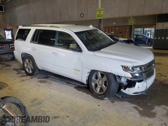 2020 Chevrolet Tahoe Premier with VIN 1GNSKCKC2LR233350, listed as a Copart auction lot 45846135 with 101,476 mi miles and Salvage title. Bid and sale history available at DreamBid. Image 4.