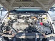 ✅ 2002 Ford Escort Fleet Standard • VIN: 3FAFP13P12R209941 • Lot: 41790208. Wystawiony na IAAI z przebiegiem 112 422 mil. Bezpłatny archiwum sprzedaży aukcyjnych z USA i szczegółowy raport historii pojazdu na DreamBid. Zdjęcie 10.