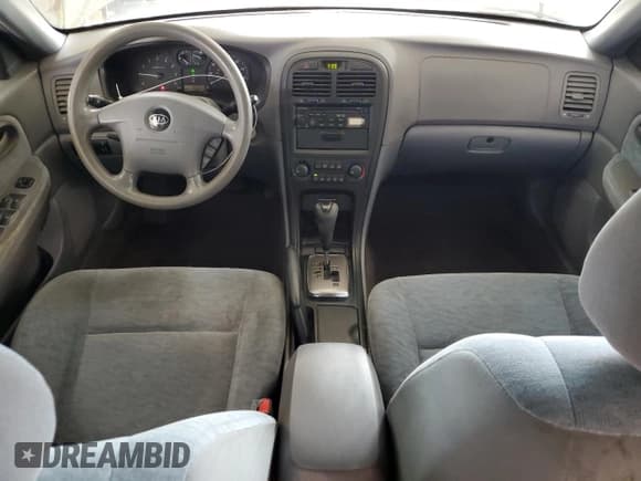 ✅ 2006 Kia Optima LX • VIN: KNAGD126665469273 • Lot: 70371855. Wystawiony na Copart z przebiegiem 238 021 mil. Bezpłatny archiwum sprzedaży aukcyjnych z USA i szczegółowy raport historii pojazdu na DreamBid. Zdjęcie 8.