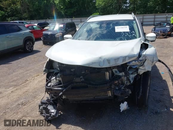 ✅ 2017 Nissan Rogue SL • VIN: 5N1AT2MT5HC884728 • Lot: 42330244. Listed on IAAI with 89,744 mi. Free auction sales archive from the USA and detailed vehicle history report at DreamBid. Image 13.