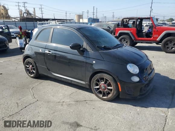 ✅ 2015 FIAT 500 Abarth • VIN: 3C3CFFFH3FT733252 • Lot: 80878265. Listed on Copart with 79,233 mi. Free auction sales archive from the USA and detailed vehicle history report at DreamBid. Image 4.