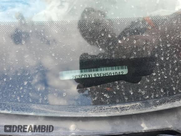 2015 Dodge Charger SRT Hellcat z VIN 2C3CDXL93FH501042, wystawiony jako Copart lot #71078075 z przebiegiem Nie podano mil oraz Szkoda całkowita • Salvage title. Historia ofert i sprzedaży dostępna na DreamBid. Obrazek 12.