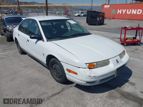 ✅ 2002 Saturn SL • VIN: 1G8ZH52802Z154555 • Lot: 42771346. Listed on IAAI with 248,496 mi. Free auction sales archive from the USA and detailed vehicle history report at DreamBid. Image 1.