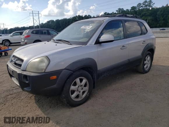 2005 Hyundai Tucson GLS z VIN KM8JN12DX5U212587, wystawiony jako Copart lot #72044114 z przebiegiem 128 993 mil mil oraz Szkoda całkowita • Salvage title. Historia ofert i sprzedaży dostępna na DreamBid. Obrazek 1.