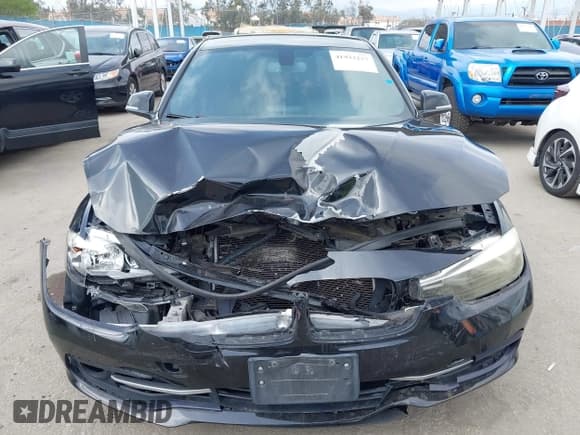 ✅ 2016 BMW 3 Series 328i • VIN: WBA8E9C57GK645661 • Lot: 41933277. Listed on IAAI with 144,996 mi. Free auction sales archive from the USA and detailed vehicle history report at DreamBid. Image 12.