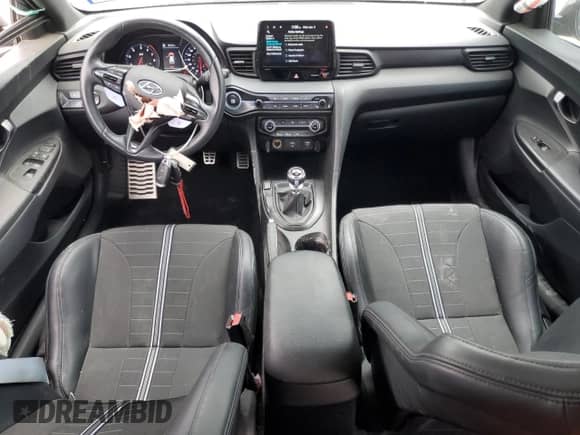 2022 Hyundai Veloster с VIN KMHT36AH2NU013176, выставлен на аукционе Copart как лот 51426135 с пробегом 74 129 миль миль и Списание • Salvage title. История ставок и продаж доступна на DreamBid. Изображение 8.