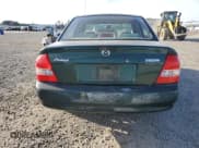 ✅ 2002 Mazda Protege DX • VIN: JM1BJ225021618037 • Lot: 92897355. Wystawiony na Copart z przebiegiem 160 409 mil. Bezpłatny archiwum sprzedaży aukcyjnych z USA i szczegółowy raport historii pojazdu na DreamBid. Zdjęcie 6.