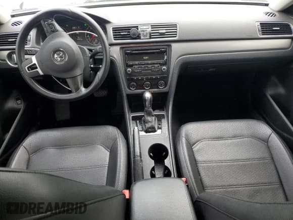 ✅ 2014 Volkswagen Passat Wolfsburg Edition • VIN: 1VWAT7A36EC056878 • Lot: 57416265. Listed on Copart with 83,981 mi. Free auction sales archive from the USA and detailed vehicle history report at DreamBid. Image 8.