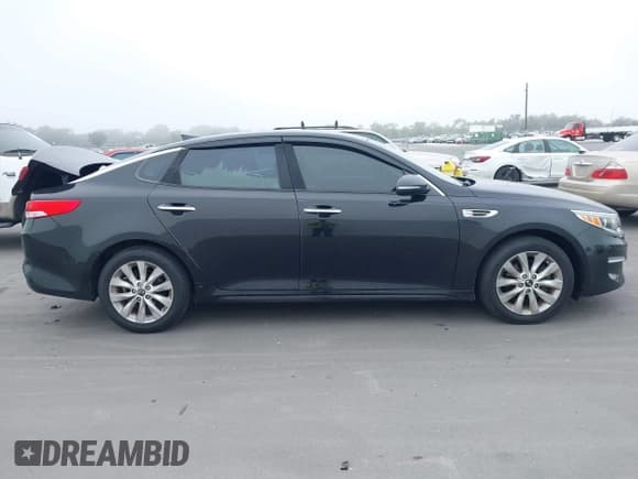 ✅ 2016 Kia Optima EX • VIN: 5XXGU4L35GG075107 • Lot: 43778757. Listed on IAAI with 61,541 mi. Free auction sales archive from the USA and detailed vehicle history report at DreamBid. Image 13.