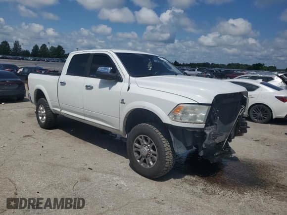 ✅ 2012 Ram 2500 Laramie • VIN: 3C6UD5FL8CG174359 • Lot: 63321605. Listed on Copart with 300,972 mi. Free auction sales archive from the USA and detailed vehicle history report at DreamBid. Image 4.