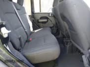 ✅ 2020 Jeep Wrangler Unlimited Black and Tan • VIN: 1C4HJXDGXLW219078 • Lot: 41783437. Wystawiony na IAAI z przebiegiem 59 137 mil. Bezpłatny archiwum sprzedaży aukcyjnych z USA i szczegółowy raport historii pojazdu na DreamBid. Zdjęcie 8.