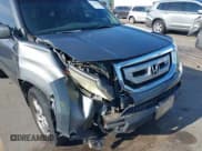 ✅ 2009 Honda Pilot EX-L • VIN: 5FNYF48689B035885 • Lot: 42601011. Wystawiony na IAAI z przebiegiem 231 493 mil. Bezpłatny archiwum sprzedaży aukcyjnych z USA i szczegółowy raport historii pojazdu na DreamBid. Zdjęcie 6.