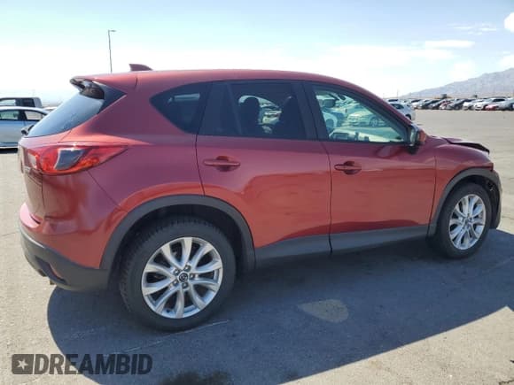 ✅ 2013 Mazda CX-5 Grand Touring • VIN: JM3KE2DE3D0154498 • Lot: 70603435. Wystawiony na Copart z przebiegiem 121 633 mil. Bezpłatny archiwum sprzedaży aukcyjnych z USA i szczegółowy raport historii pojazdu na DreamBid. Zdjęcie 3.