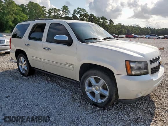 ✅ 2013 Chevrolet Tahoe LTZ • VIN: 1GNSCCE03DR250948 • Lot: 67090695. Listed on Copart with 99,804 mi. Free auction sales archive from the USA and detailed vehicle history report at DreamBid. Image 4.