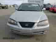 2005 Hyundai Elantra GLS z VIN KMHDN46D75U115937, wystawiony jako Copart lot #77410514 z przebiegiem 128 015 mil mil oraz Szkoda całkowita • Salvage title. Historia ofert i sprzedaży dostępna na DreamBid. Obrazek 5.