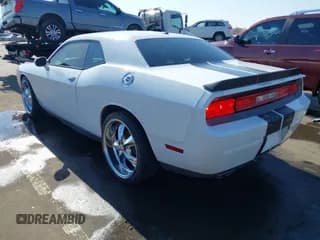 ✅ 2013 Dodge Challenger SXT • VIN: 2C3CDYAG3DH573945 • Lot: 41443472. Wystawiony na IAAI z przebiegiem 149 823 mil. Bezpłatny archiwum sprzedaży aukcyjnych z USA i szczegółowy raport historii pojazdu na DreamBid. Zdjęcie 3.
