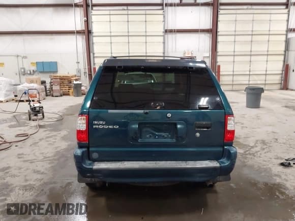 ✅ 1998 Isuzu Rodeo S • VIN: 4S2CK58W4W4337404 • Lot: 43075464. Listed on IAAI with 235,177 mi. Free auction sales archive from the USA and detailed vehicle history report at DreamBid. Image 16.