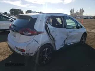 2019 Chevrolet Bolt EV Premier z VIN 1G1FZ6S03K4127488, wystawiony jako Copart lot #77182273 z przebiegiem 65 632 mil mil oraz . Historia ofert i sprzedaży dostępna na DreamBid. Obrazek 3.