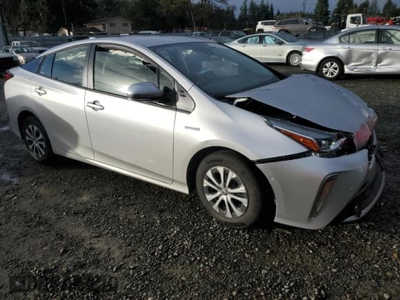 ✅ 2021 Toyota Prius XLE • VIN: JTDL9MFU1M3027975 • Lot: 93428795. Listed on Copart with 39,450 mi. Free auction sales archive from the USA and detailed vehicle history report at DreamBid. Image 4.