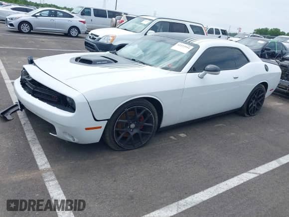 2015 Dodge Challenger R/T Plus with VIN 2C3CDZBT6FH855680, listed as a IAAI auction lot 42233944 with 141,371 mi miles and . Bid and sale history available at DreamBid. Image 2.
