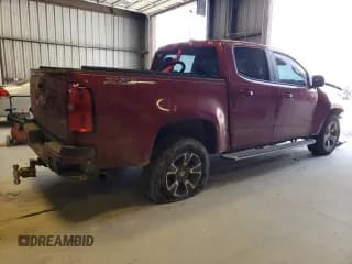 ✅ 2015 Chevrolet Colorado 4WD Z71 • VIN: 1GCGTCE30F1193070 • Лот: 46403204. Опубликован ранее на Copart с пробегом 119 052 миль. Бесплатный доступ к архиву аукционных продаж из США и подробный отчёт об истории автомобиля на DreamBid. Изображение 3.