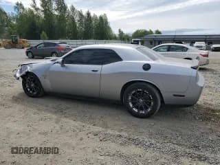 ✅ 2014 Dodge Challenger R/T 100th Anniversary Appearance • VIN: 2C3CDYBT2EH231724 • Lot: 64277304. Wystawiony na Copart z przebiegiem 103 217 mil. Bezpłatny archiwum sprzedaży aukcyjnych z USA i szczegółowy raport historii pojazdu na DreamBid. Zdjęcie 2.