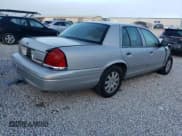 ✅ 2007 Ford Crown Victoria LX • VIN: 2FAFP74V97X145740 • Lot: 84583165. Listed on Copart with 171,768 mi. Free auction sales archive from the USA and detailed vehicle history report at DreamBid. Image 3.