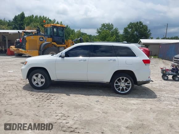 ✅ 2015 Jeep Grand Cherokee • VIN: 1C4RJEJM8FC674648 • Lot: 42785823. Listed on IAAI with 207,084 mi. Free auction sales archive from the USA and detailed vehicle history report at DreamBid. Image 14.