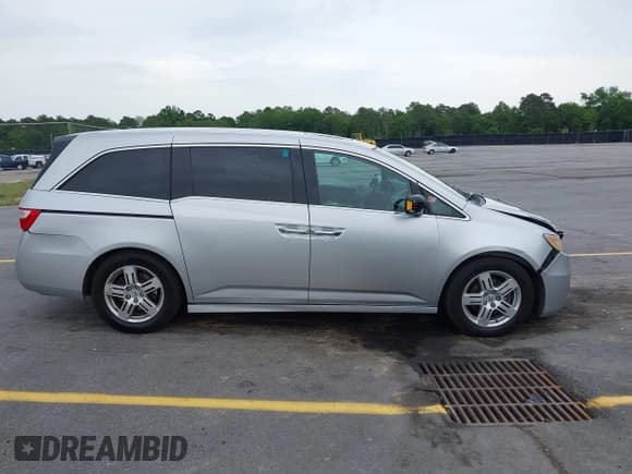 ✅ 2012 Honda Odyssey Touring • VIN: 5FNRL5H93CB122128 • Лот: 42206838. Опубликован ранее на IAAI с пробегом 181 605 миль. Бесплатный доступ к архиву аукционных продаж из США и подробный отчёт об истории автомобиля на DreamBid. Изображение 13.