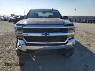 ✅ 2018 Chevrolet Silverado 1500 LT • VIN: 1GCVKREC2JZ215612 • Лот: 70295784. Опубликован ранее на Copart с пробегом 57 722 миль. Бесплатный доступ к архиву аукционных продаж из США и подробный отчёт об истории автомобиля на DreamBid. Изображение 5.