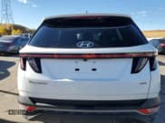✅ 2022 Hyundai Tucson SEL • VIN: 5NMJFCAE8NH033348 • Lot: 76280764. Wystawiony na Copart z przebiegiem 26 869 mil. Bezpłatny archiwum sprzedaży aukcyjnych z USA i szczegółowy raport historii pojazdu na DreamBid. Zdjęcie 6.
