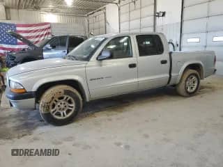 2002 Dodge Dakota Sport с VIN 1B7HL38N62S507858, выставлен на аукционе Copart как лот 48331335 с пробегом 200 521 миль миль и Списание • Salvage title. История ставок и продаж доступна на DreamBid. Изображение 1.