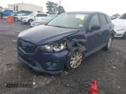 ✅ 2013 Mazda CX-5 Touring • VIN: JM3KE2CE1D0132257 • Lot: 42700625. Listed on IAAI with 87,796 mi. Free auction sales archive from the USA and detailed vehicle history report at DreamBid. Image 2.