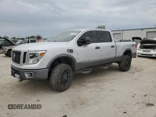 ✅ 2018 Nissan Titan Platinum Reserve • VIN: 1N6BA1F41JN516259 • Lot: 71754005. Wystawiony na Copart z przebiegiem 122 043 mil. Bezpłatny archiwum sprzedaży aukcyjnych z USA i szczegółowy raport historii pojazdu na DreamBid. Zdjęcie 1.