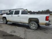 ✅ 2018 GMC Sierra 2500HD • VIN: 1GT12REY5JF202154 • Лот: 79009504. Опубликован ранее на Copart с пробегом 248 716 миль. Бесплатный доступ к архиву аукционных продаж из США и подробный отчёт об истории автомобиля на DreamBid. Изображение 2.