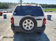 ✅ 2002 Jeep Liberty Sport • VIN: 1J4GK48K42W170619 • Lot: 70095155. Listed on Copart with 101,948 mi. Free auction sales archive from the USA and detailed vehicle history report at DreamBid. Image 6.