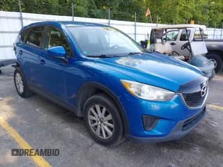 ✅ 2014 Mazda CX-5 Sport • VIN: JM3KE2BE7E0332563 • Lot: 42770891. Listed on IAAI with 145,924 mi. Free auction sales archive from the USA and detailed vehicle history report at DreamBid. Image 1.