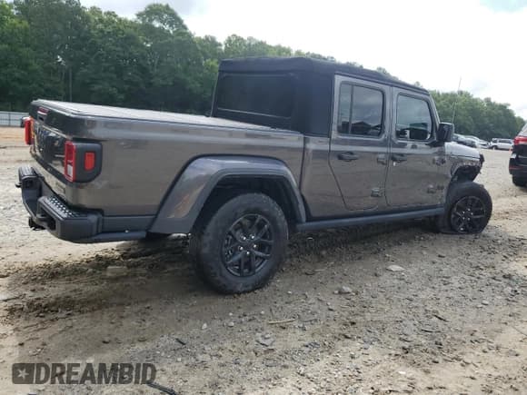 ✅ 2023 Jeep Gladiator Sport • VIN: 1C6JJTAG7PL516080 • Lot: 60315075. Listed on Copart with 41,278 mi. Free auction sales archive from the USA and detailed vehicle history report at DreamBid. Image 3.
