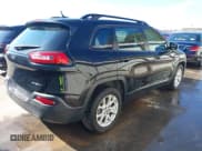 ✅ 2015 Jeep Cherokee Sport • VIN: 1C4PJLAB2FW616995 • Lot: 43384570. Listed on IAAI with 103,934 mi. Free auction sales archive from the USA and detailed vehicle history report at DreamBid. Image 4.