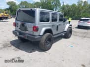 ✅ 2021 Jeep Wrangler Unlimited Sahara • VIN: 1C4HJXEN9MW637288 • Lot: 42553459. Listed on IAAI with 39,362 mi. Free auction sales archive from the USA and detailed vehicle history report at DreamBid. Image 4.