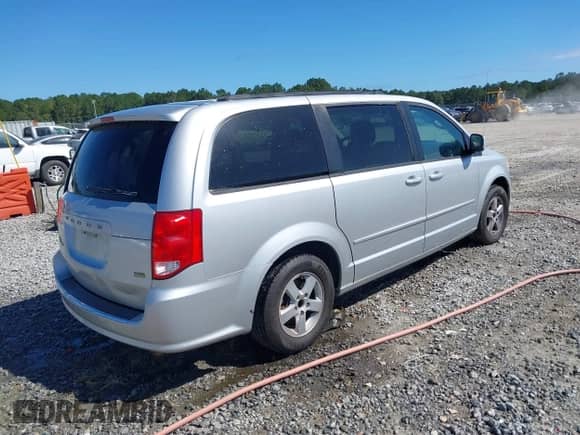 2012 Dodge Grand Caravan SXT z VIN 2C4RDGCG3CR196667, wystawiony jako IAAI lot #43337805 z przebiegiem 167 558 mil mil oraz . Historia ofert i sprzedaży dostępna na DreamBid. Obrazek 4.