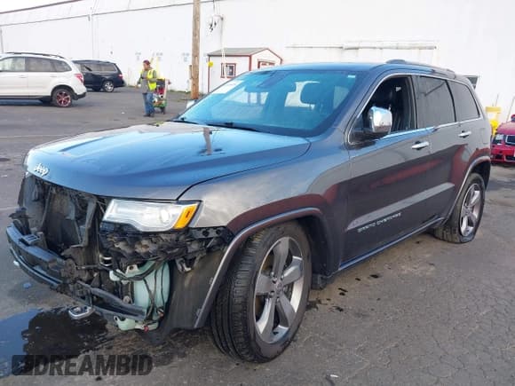 ✅ 2015 Jeep Grand Cherokee Overland • VIN: 1C4RJFCG3FC697994 • Lot: 40526924. Listed on IAAI with 199,275 mi. Free auction sales archive from the USA and detailed vehicle history report at DreamBid. Image 2.