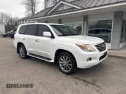 ✅ 2011 Lexus LX 570 • VIN: JTJHY7AX9B4071559 • Lot: 41860921. Listed on IAAI with 201,449 mi. Free auction sales archive from the USA and detailed vehicle history report at DreamBid. Image 1.