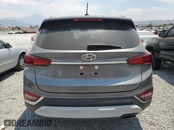 ✅ 2019 Hyundai Santa Fe SE • VIN: 5NMS2CAD4KH107738 • Lot: 62054324. Wystawiony na Copart z przebiegiem 54 904 mil. Bezpłatny archiwum sprzedaży aukcyjnych z USA i szczegółowy raport historii pojazdu na DreamBid. Zdjęcie 6.