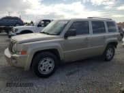 ✅ 2010 Jeep Patriot Sport • VIN: 1J4NT2GB2AD558274 • Lot: 89495985. Listed on Copart with 102,408 mi. Free auction sales archive from the USA and detailed vehicle history report at DreamBid. Image 1.