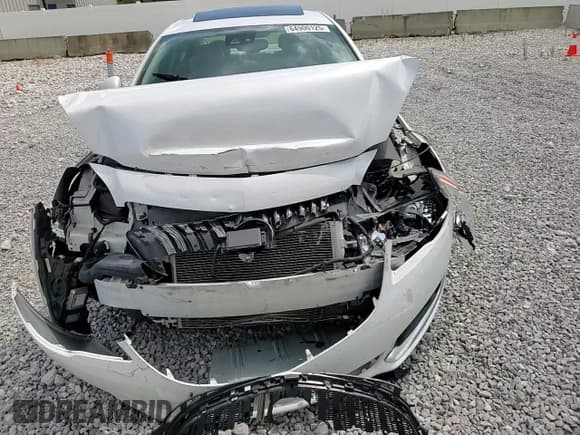 ✅ 2016 Buick Regal Premium II • VIN: 2G4GT5GX2G9121212 • Lot: 64900125. Listed on Copart with 132,056 mi. Free auction sales archive from the USA and detailed vehicle history report at DreamBid. Image 13.