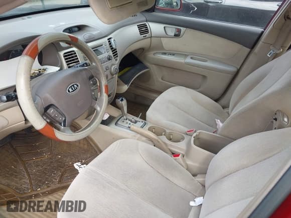 ✅ 2007 Kia Optima LX • VIN: KNAGE123175088371 • Лот: 43179487. Опубликован ранее на IAAI с пробегом 110 302 миль. Бесплатный доступ к архиву аукционных продаж из США и подробный отчёт об истории автомобиля на DreamBid. Изображение 13.