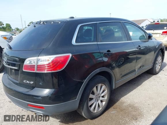 ✅ 2010 Mazda CX-9 Sport • VIN: JM3TB2MA7A0236918 • Lot: 42060510. Listed on IAAI with 201,690 mi. Free auction sales archive from the USA and detailed vehicle history report at DreamBid. Image 4.