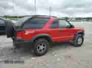 1999 Chevrolet Blazer LS z VIN 1GNCT18W3XK150385, wystawiony jako Copart lot #58490985 z przebiegiem 262 007 mil mil oraz Szkoda całkowita • Salvage title. Historia ofert i sprzedaży dostępna na DreamBid. Obrazek 3.